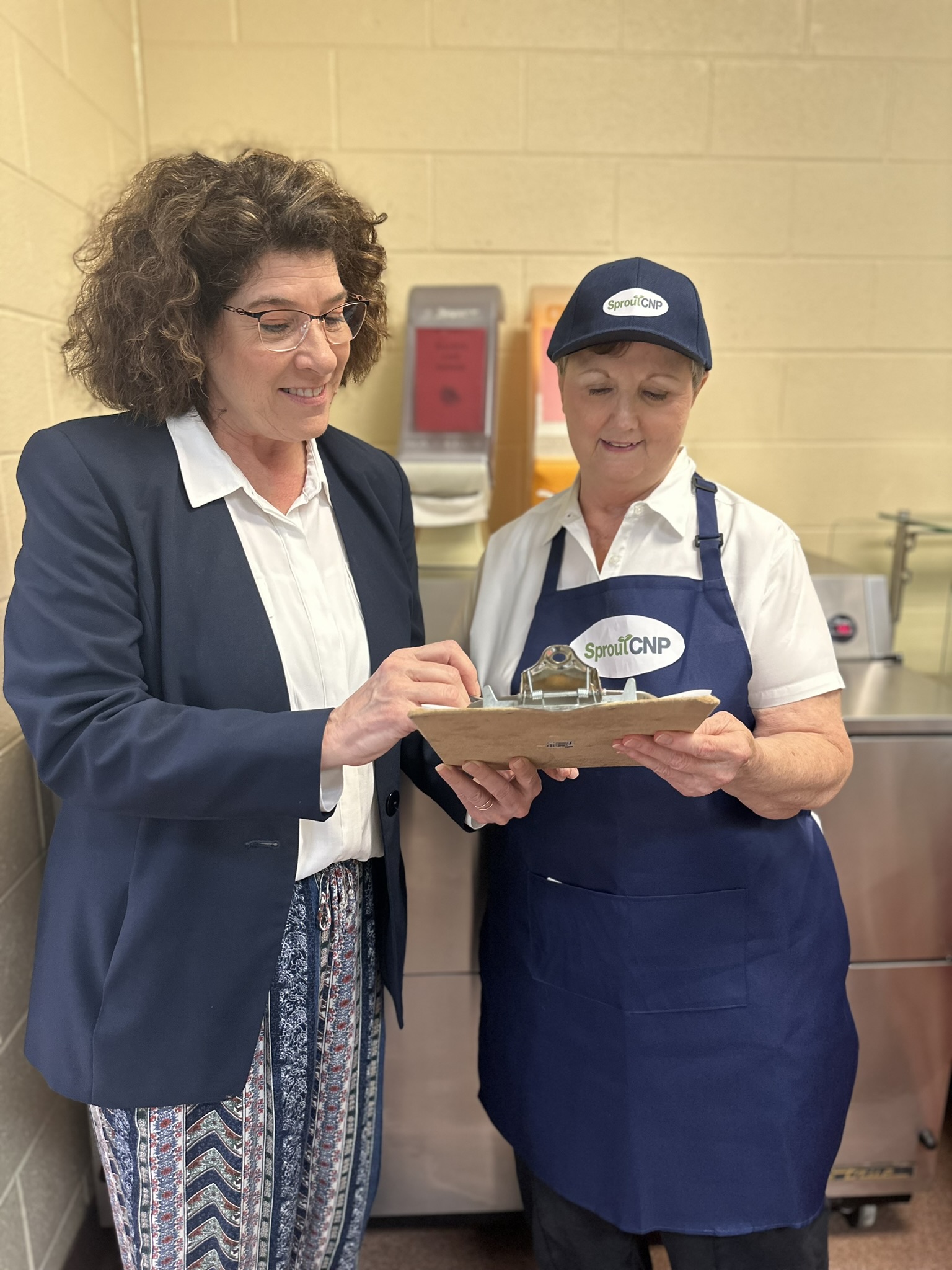 director with a team member