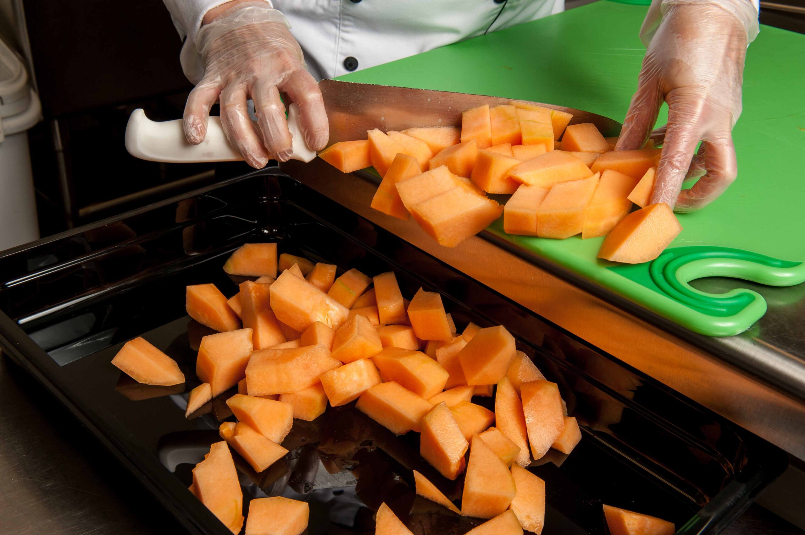 cutting cantaloupe